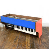 Sean Sullivan, The Composer (the sound of Sunrise,  Sunset, 2O22 organ, vinyl paint, wire, metal tape, 14 x 29 x 1O inches